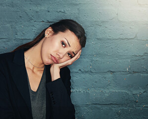 Portrait, brick wall and business with woman, stress and tired with burnout, overworked and...