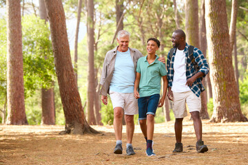 Active Three Generation Male Family On Outdoor Hike In Countryside Together