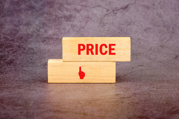 Price word written on wooden blocks on a dark background