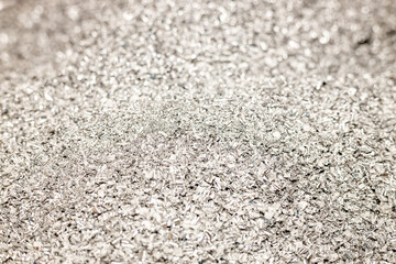 Aluminum filings, Remains after cutting aluminum profiles, Industrial background
