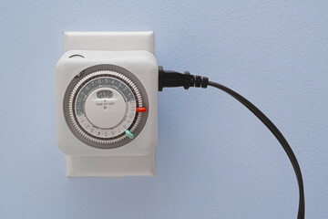 Electrical outlet timer and power cord