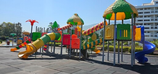 Colorful playground with tipped slides