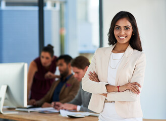 Business woman, portrait and confident in office for work, company and job with smile. Indian...