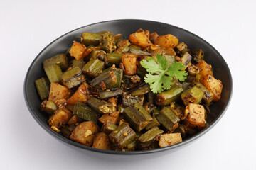 Aloo Bhindi, Potato Bhindi masala or Potato okra or lady finger fry served with Roti or Chapati or Rice ,indian food