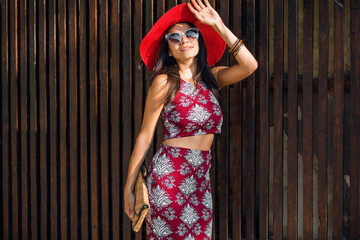 stylish beautiful woman in printed outfit, summer style fashion