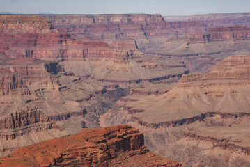 Explore the stunning Grand Canyon in Arizona, USA. Marvel at the intricate landscape of red rock...