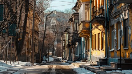 Fototapeta premium A narrow street covered in snow, perfect for winter scenes