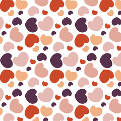 Fototapeta premium Vector seamless pattern of round hearts on a white background. Red, pink, purple shades, mosaic arrangement.