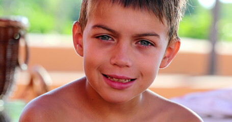 Portrait of of young boy child smiling to camera