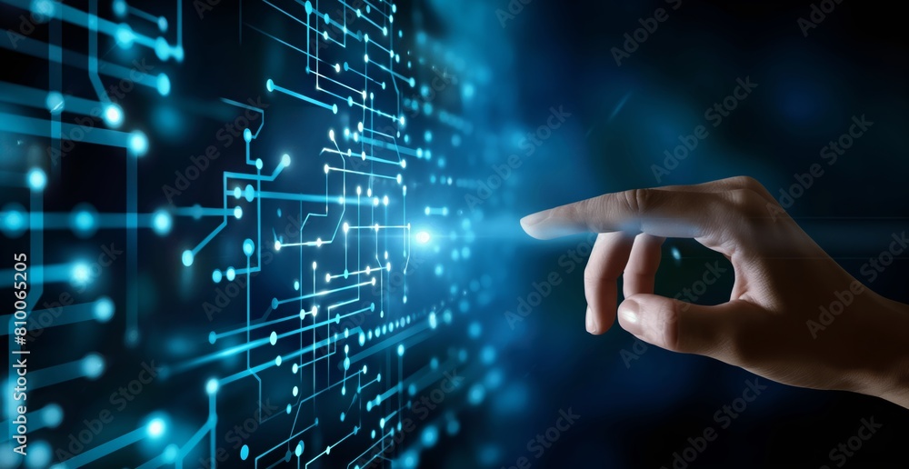 Poster banner, a hand is pointing at a computer screen with a blue background. concept of technology and in