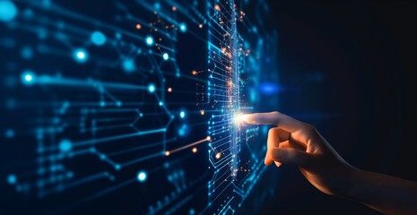 A hand is pointing at a computer screen with a blue background. Concept of technology and innovation, as the hand is interacting with the digital display. The blue color scheme