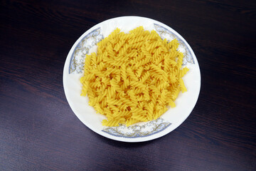 Shahi Chicken Pasta is made with chicken meat, egg, pasta, tomato, carrot, onion, lemon, garlic, green chili, cabbage and other ingredients. It is very tasty to eat and Spicy Flair