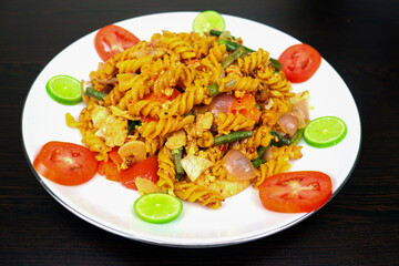 Shahi Chicken Pasta is made with chicken meat, egg, pasta, tomato, carrot, onion, lemon, garlic, green chili, cabbage and other ingredients. It is very tasty to eat and Spicy Flair