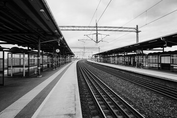 View of a train station in black and white