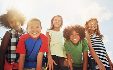 Children, friends and portrait or outdoor group in sunshine for school trip or bonding, diversity...