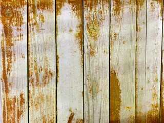 Golden autumn wooden fence background. Close-up wall or floor wooden golden plank panel or board as...