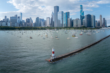 Aerial view of downtown Chicago, Illinois, USA. Over Lake Michigan looking towards small lighthouse...