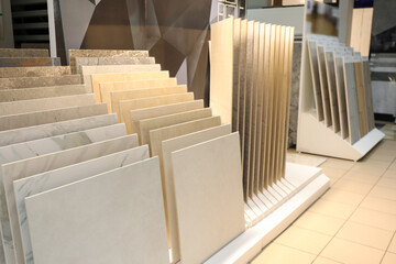 Assortment of tiles in store. Many different samples indoors