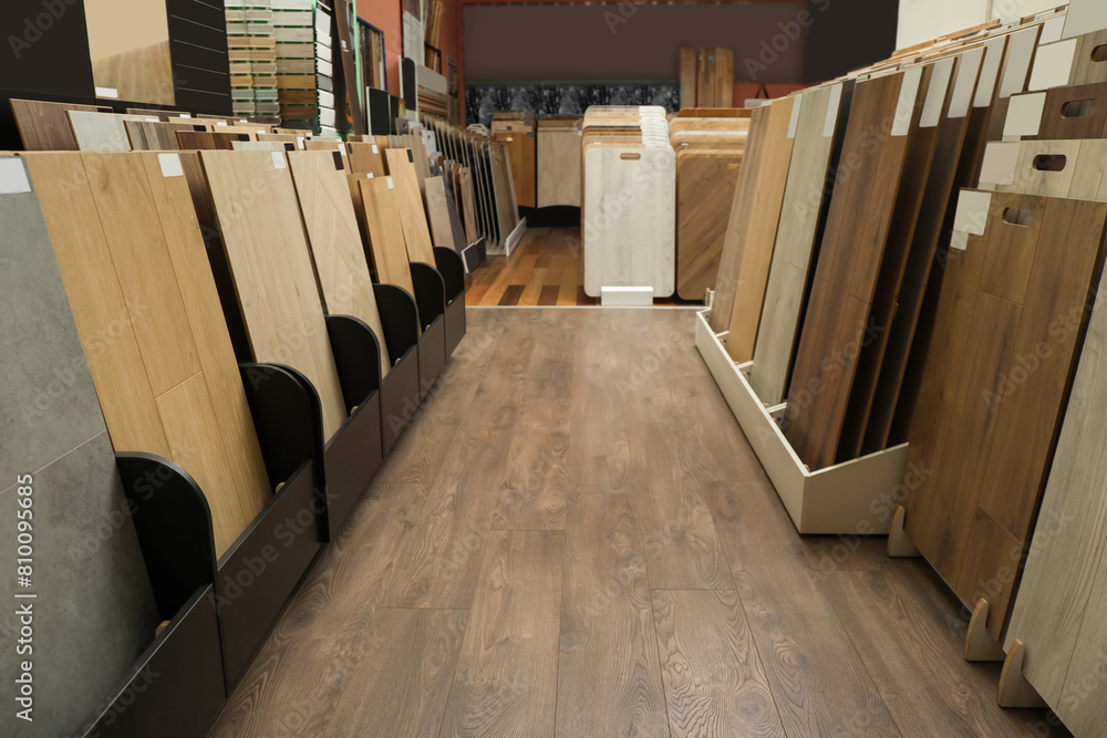 Poster Many different samples of wooden flooring in store