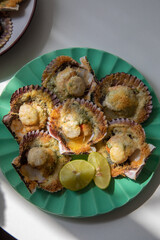 Conchitas a la parmesana grilled scallops with parmesan cheese grated peru peruvian food latin american