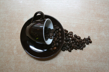 Coffee beans and coffee cup