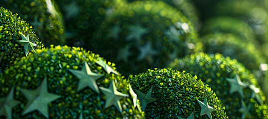 Ultra HD close-up of a topiary hedge shaped into a series of stars and moons, emphasizing the...