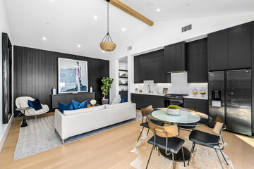 Living Room With Couch, Table, and Refrigerator