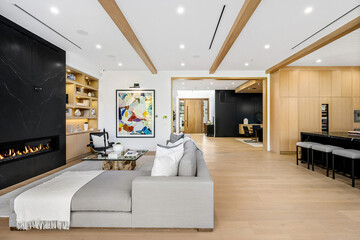 A Living Room With a Couch, Table, and Fireplace