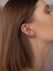 close up portrait of a woman 
earrings