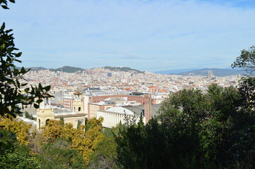 Obraz premium Panorama of Barcelona - urban development and historic buildings.,Catalan architecture, mountains and greenery, Spain