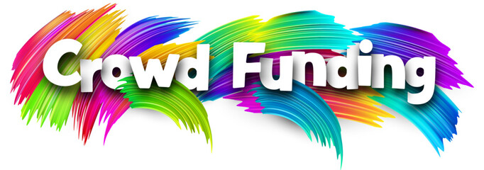 Crowd funding paper word sign with colorful spectrum paint brush strokes over white.