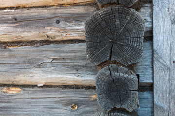 natural wooden background. wall made of old logs, place for an inscription