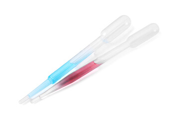 Two transfer pipettes with liquid isolated on white