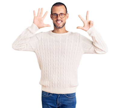 Young handsome man wearing casual clothes and glasses showing and pointing up with fingers number eight while smiling confident and happy.