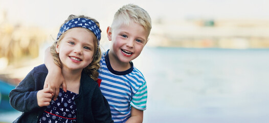 Happy, siblings and hug in outdoor for portrait with love, bonding and family, holiday and beach in...