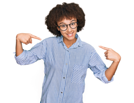 Young hispanic girl wearing business shirt and glasses looking confident with smile on face, pointing oneself with fingers proud and happy.