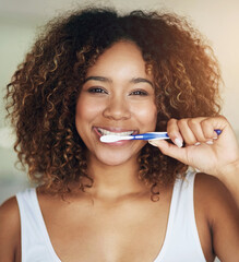 Black woman, portrait and smile with toothbrush for teeth in bathroom with dental hygiene in house. Happy, morning and everyday routine with refreshing breath, getting ready and care with daily habit
