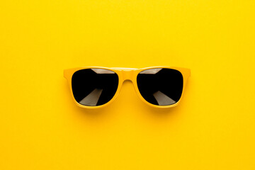 studio shot of yellow sunglasses