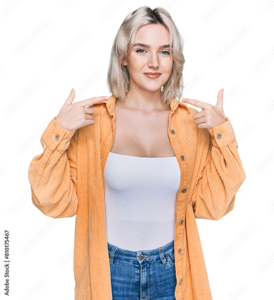 Poster Young blonde girl wearing casual clothes looking confident with smile on face, pointing oneself with fingers proud and happy.