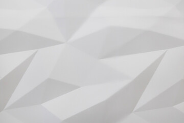 3D white geometric background. Seamless texture, triangles of different shapes. The concept of a...