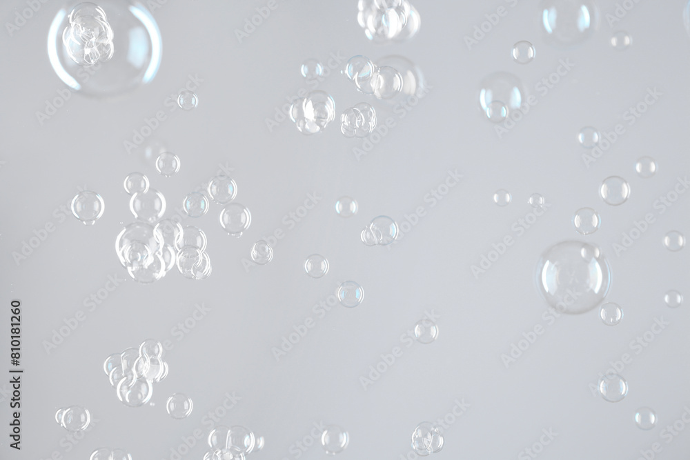 Canvas Prints Beautiful transparent soap bubbles on light grey background