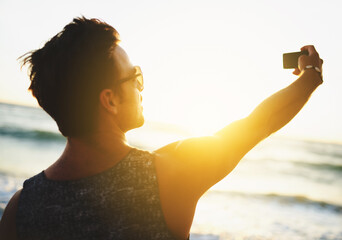 Man, selfie and ocean sunset for summer memory or social media post for Thailand trip, sun or...