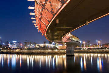 Illuminated city bridge at twilight