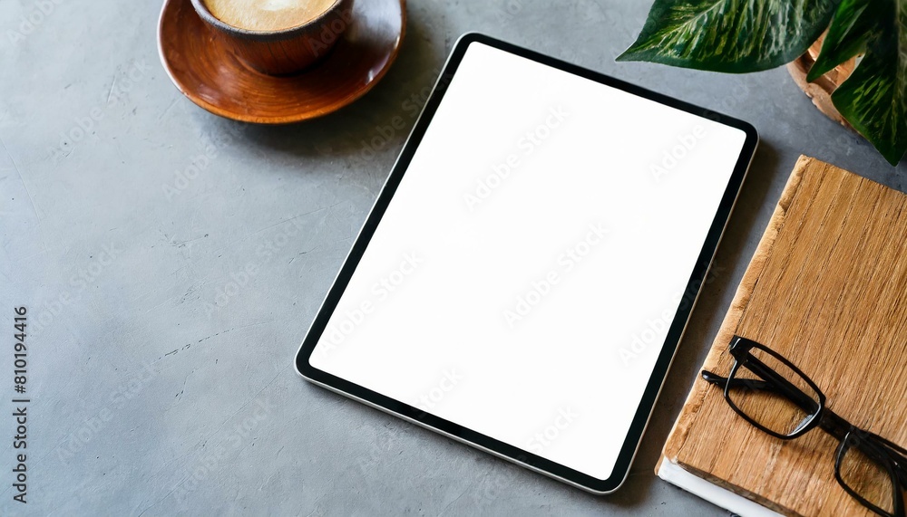 Poster tablet on table with decoration - tablet mockup for application presentation, web design or user int