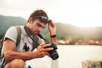 Man, camera and travel photographer at mountain as photo journalist for tourism, hobby or water....