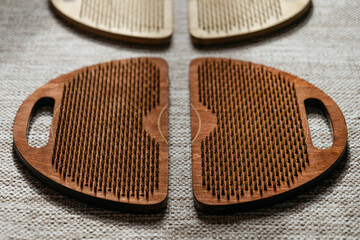 Elegant wooden acupressure boards with focused light and shadow contrasts