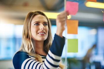 Woman, sticky note and brainstorming project in office as company growth or market research, glass...