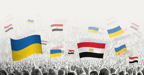 People waving flag of Egypt and Ukraine, symbolizing Egypt solidarity for Ukraine.