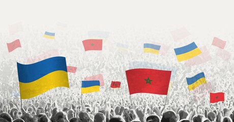 People waving flag of Morocco and Ukraine, symbolizing Morocco solidarity for Ukraine.