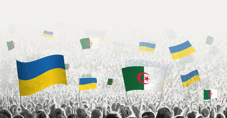 People waving flag of Algeria and Ukraine, symbolizing Algeria solidarity for Ukraine.